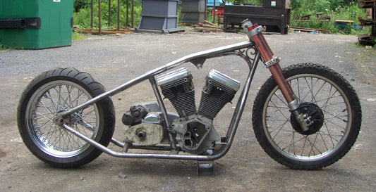 Custom bobber frame from MotoXcycle MXC uses wrought iron pieces from Heritage building in Westmount, Quebec Canada